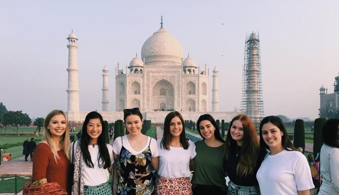Taj Mahal with female tourist - Alamgir Taj Mahal Guide