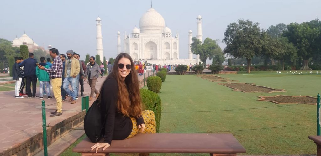 Solo Tourist sitting on Stone Table in Taj Mahal